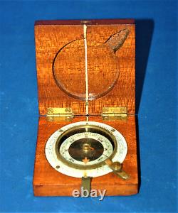 A 1918 military floating dial compass, Francis Mfg Co. No. 4460, mahogany case