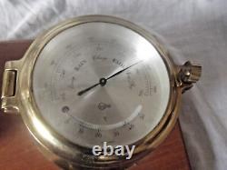 A Combination Barometer & Thermometer & Clock both by Barigo