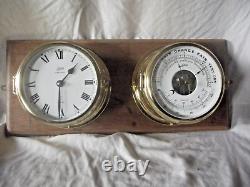 A Combination Barometer & Thermometer with a Ship Spell Clock both by Schatz