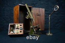 Antique Brass Microscope with a Bullseye Lens on Stand in a Mahogany Case