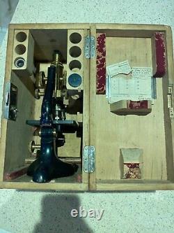 Antique Ernst Leitz Wetzlar Microscope and storage box And Extras