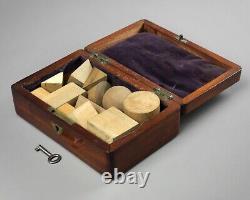 Antique Victorian boxed set of wooden geometric shapes/solids scientific