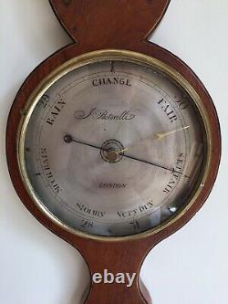 Antique barometer and thermometer wall mounted