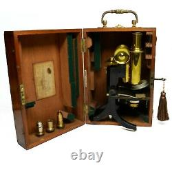 Antique lacquered brass compound microscope by James Swift of London