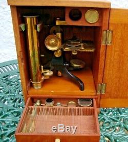 Antique late Victorian lacquered brass compound monocular cased microscope