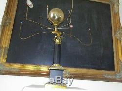 Antiqued orrery planetarium solar system by SC artist, Will S. Anderson