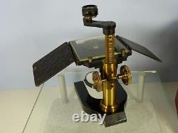 C. Baker Dissecting Microscope + Fitted Box + Hand Rests