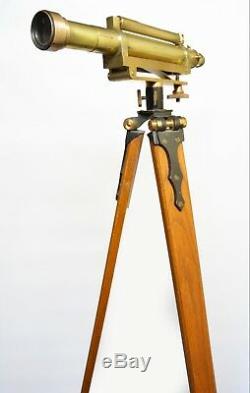 Cased antique surveyors level on period oak tripod stand, W F Stanley, 1920s