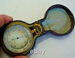 Circa 1900 cased pocket barometer marked WEATHERTEL in gilt brass cased
