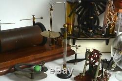 Early antique electric motor and electrostatic collection with Wimshurst machine
