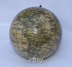Fine 3 inch terrestrial globe in lignum vitae case Woodward