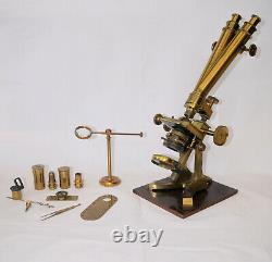 Large binocular microscope in case with accessories. S & B Solomons