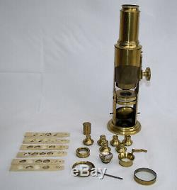 Large drum microscope in case with accessories requiring attention