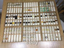 Microscope slides. Nine trays carrying over 90 antique slides. Some rare types