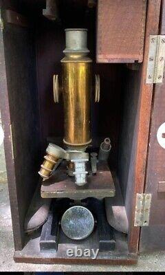 Vintage Brass Spencer Buffalo USA microscope with wooden case